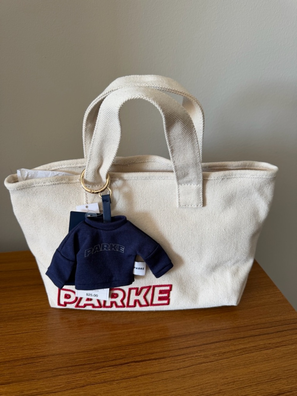 PARKE Embroidered Canvas Tote in Natural with Navy Charm